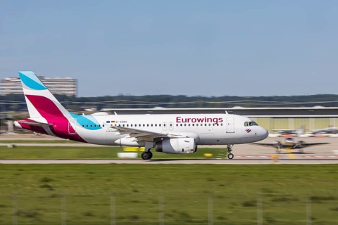 Stuttgart Airport with aircraft on the runway. Aircraft registration number: D-AGWV, Eurowings,