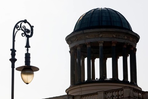 Old gas lantern and dome of the Stüler building backlit, Spandauer Damm, Charlottenburg, Berlin,