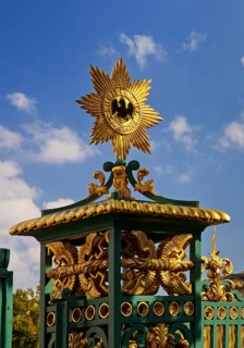 Golden star with black eagle on the fence of Charlottenburg Palace, Berlin, Germany