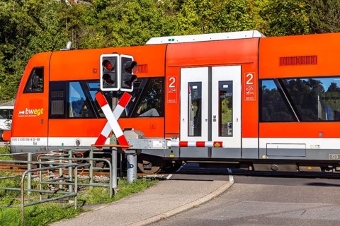 Level crossing at Nagold station with DB Regio railcars. The train is travelling on behalf of the