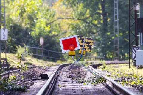 Track closed. The signal is called Sh2 (protective stop) . The stop sign is placed in front of