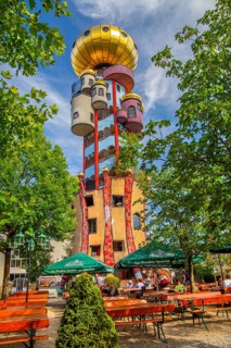Beer garden of the Kuchlbauer brewery in front of the Kuchlbauer tower by architect Friedensreich