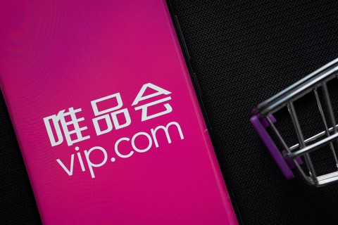 Dhaka, Bangladesh- 03 July 2025: A smartphone displaying the vip.com logo next to a miniature
