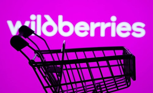 Dhaka, Bangladesh- 03 July 2025: Silhouette of a shopping cart in front of the Wildberries logo,
