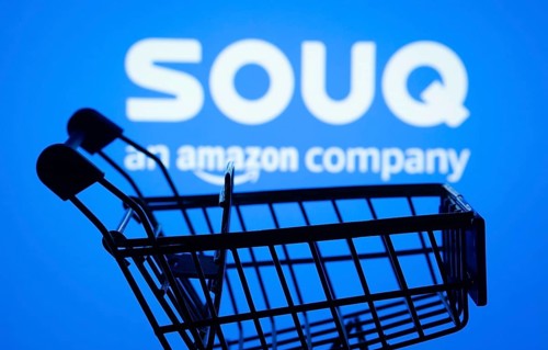 Dhaka, Bangladesh- 03 July 2025: Silhouette of a shopping cart in front of the Souq logo,