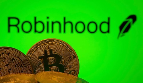 Dhaka, Bangladesh- 20 Sep 2025: Close-up of Bitcoin coins with the Robinhood Markets logo visible