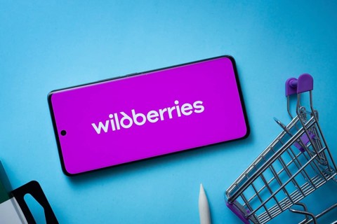 Dhaka, Bangladesh- 03 July 2025: Smartphone displaying Wildberries logo with shopping cart on a
