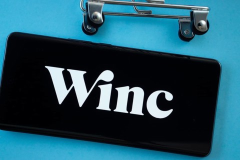 Dhaka, Bangladesh- 03 July 2025: Smartphone screen showing the Winc logo with shopping cart wheels