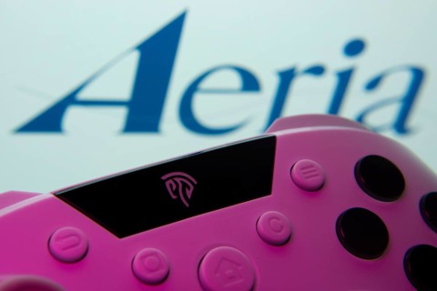 Dhaka, Bangladesh- 23 Sep 2025: A close-up of a gamepad with the Aeria seen on screen in the