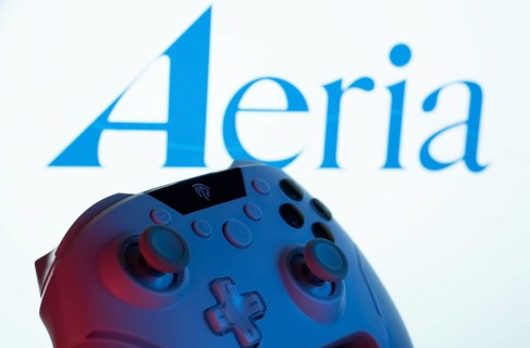Dhaka, Bangladesh- 23 Sep 2025: A close-up of a gamepad with the Aeria seen on screen in the