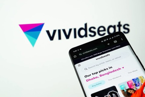 Dhaka, Bangladesh- 03 July 2025: Smartphone displaying VividSeats web interface against (....) logo