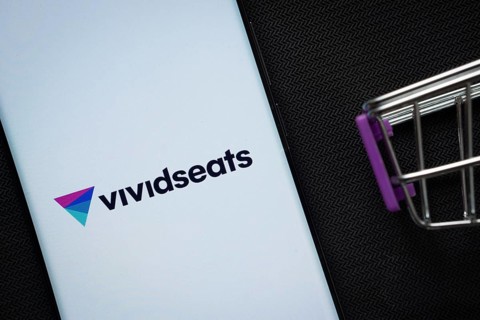 Dhaka, Bangladesh- 03 July 2025: A smartphone displaying the VividSeats logo next to a miniature