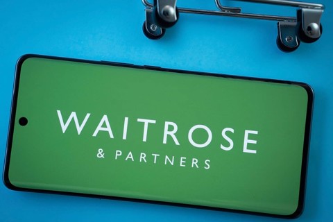 Dhaka, Bangladesh- 03 July 2025: Smartphone screen showing the Waitrose & Partners logo with