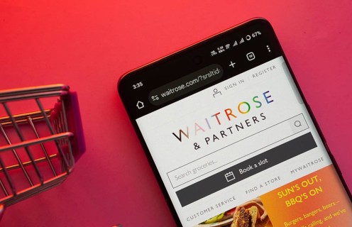 Dhaka, Bangladesh- 23 June 2025: A smartphone displaying the Waitrose & Partners website with a