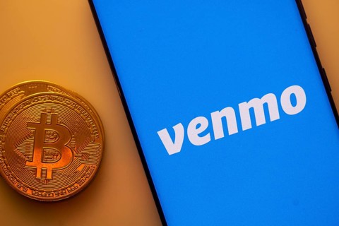 A Bitcoin and Venmo logo on a blue screen representing cryptocurrency