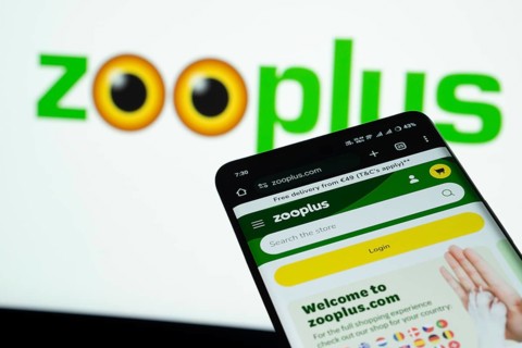 Dhaka, Bangladesh- 03 July 2025: Smartphone displaying zooplus web interface against Zooplus logo