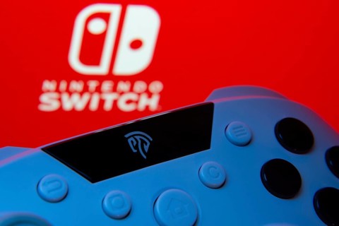 Dhaka, Bangladesh- 15 July 2025: A close-up of a gamepad with thenintendo switch seen on screen in