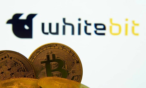 Dhaka, Bangladesh- 03 Sep 2025: Close-up of Bitcoin coins with the whitebit logo visible on a