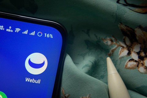 Dhaka, Bangladesh- 07 May 2025: webull app icon is seen on smartphone
