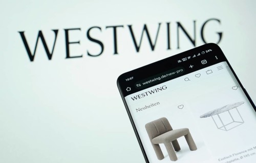 Dhaka, Bangladesh- 03 July 2025: Smartphone displaying Westwing web interface against Westwing logo