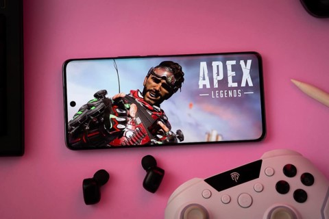 Dhaka, Bangladesh- 19 Sep 2025: A close-up of a white gamepad with the Apex Legends mobile seen on