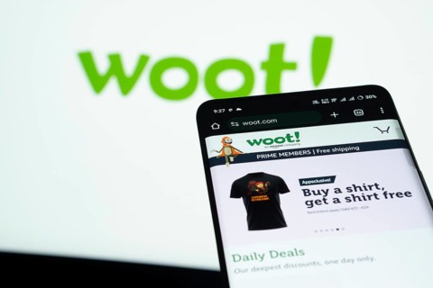 Dhaka, Bangladesh- 03 July 2025: Smartphone displaying Woot web interface against woot logo