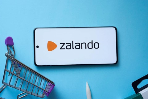 Dhaka, Bangladesh- 03 July 2025: Smartphone displaying Zalando logo with shopping cart on a blue