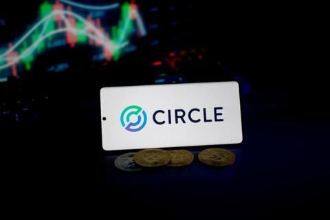 Circle logo highlighted with coins and fluctuating market charts, emphasizing digital trade