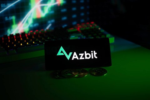 Azbit logo on phone, displayed with coins and stock chart, emphasizing finance and technology