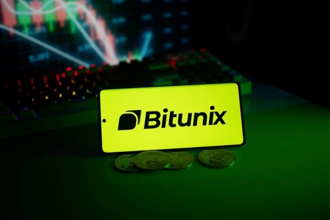 Bitunix logo in a bright neon green setting with coins and trading charts in the background
