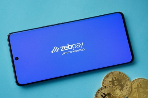 Dhaka, Bangladesh- 03 Sep 2025: zebpay logo on smartphone screen near Bitcoin coin and QR code on