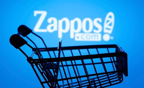 Dhaka, Bangladesh- 03 July 2025: Silhouette of a shopping cart in front of the Zappos logo,