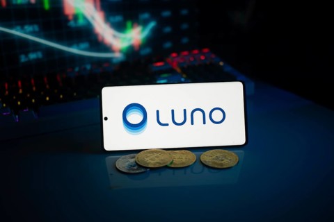 Luno logo alongside coins and a market trend graph in vibrant lighting