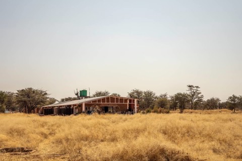 Outjo is a quiet Namibian town surrounded by savannas and hills, with dry sunny nature, calm daily