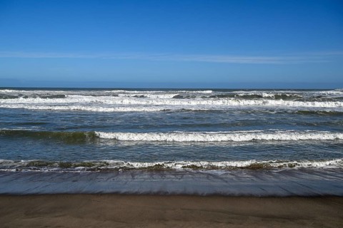 Beach on the Atlantic Ocean near Oranjemund, diamond restricted area, Karas region, Namibia