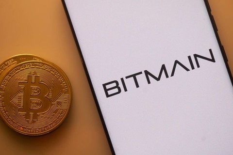 Bitmain displayed on a white screen with Bitcoin coin, related to crypto mining