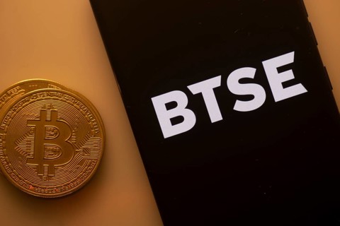 A Bitcoin coin paired with a smartphone displaying the BTSE logo in orange