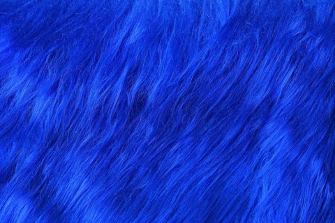 Close up of bright blue synthetic fake fur