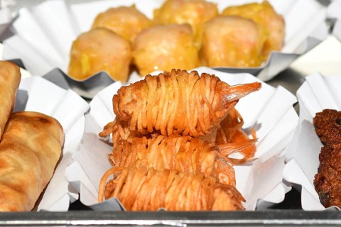 Fried Thai street food potato noodle prawns on small trays