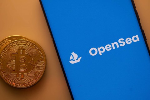 Bitcoin coin alongside OpenSea logo on a blue background, related to NFT trade