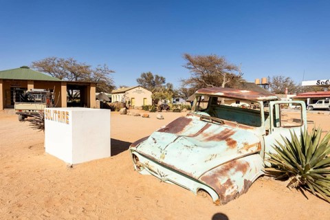 Solitaire's car graveyard in Namibia - 27 August, 2025: features rusted vintage cars near small