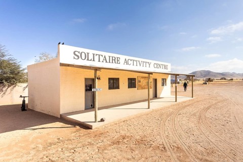 Solitaire Activity Centre in Namibia - 27 August, 2025, surrounded by golden sand dunes and rugged