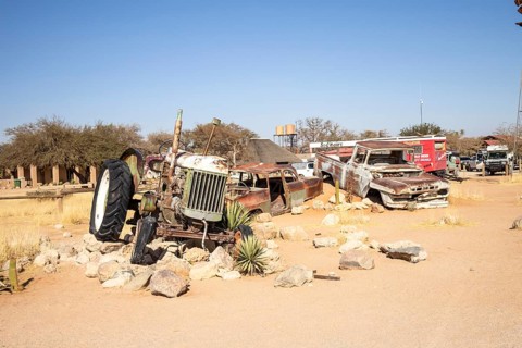 Solitaire's car graveyard in Namibia 27 August, 2025: features rusted vintage cars near small