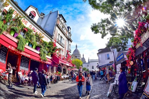 Place du Tertre in the Parisian artists' quarter of Montmartre in Paris, with the Sacre Coeur