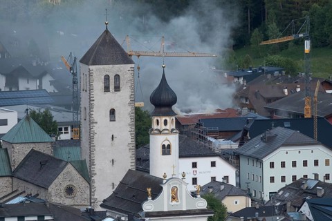 View of a burning building in the town centre of San Candido, San Candido, Val Pusteria, Sesto