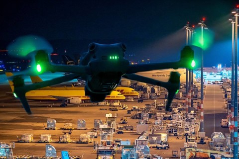 Symbolic image, photomontage, reconnaissance, spying with drones here at an airport, critical