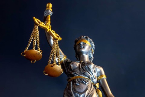 Close-up of a Justitia as a symbol of court judgements, jurisdiction, justice, etc