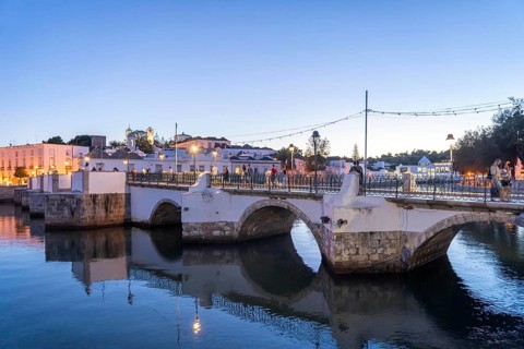 The seven-arched bridge over the Rio Gilão, in Tavira, old town, in the east of the Algarve,