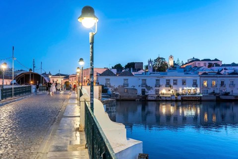The seven-arched bridge over the Rio Gilão, in Tavira, old town, in the east of the Algarve,