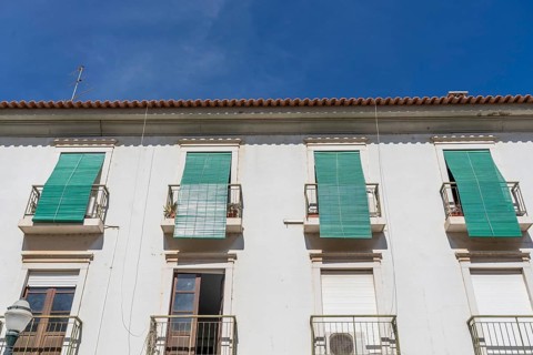 Facade of buildings in Tavira, old town, in the east of the Algarve, Portugal